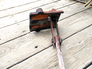 removed hanger with its open clamp