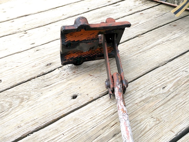 removed hanger with its open clamp